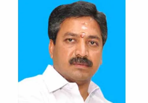 CV Shanmugam  